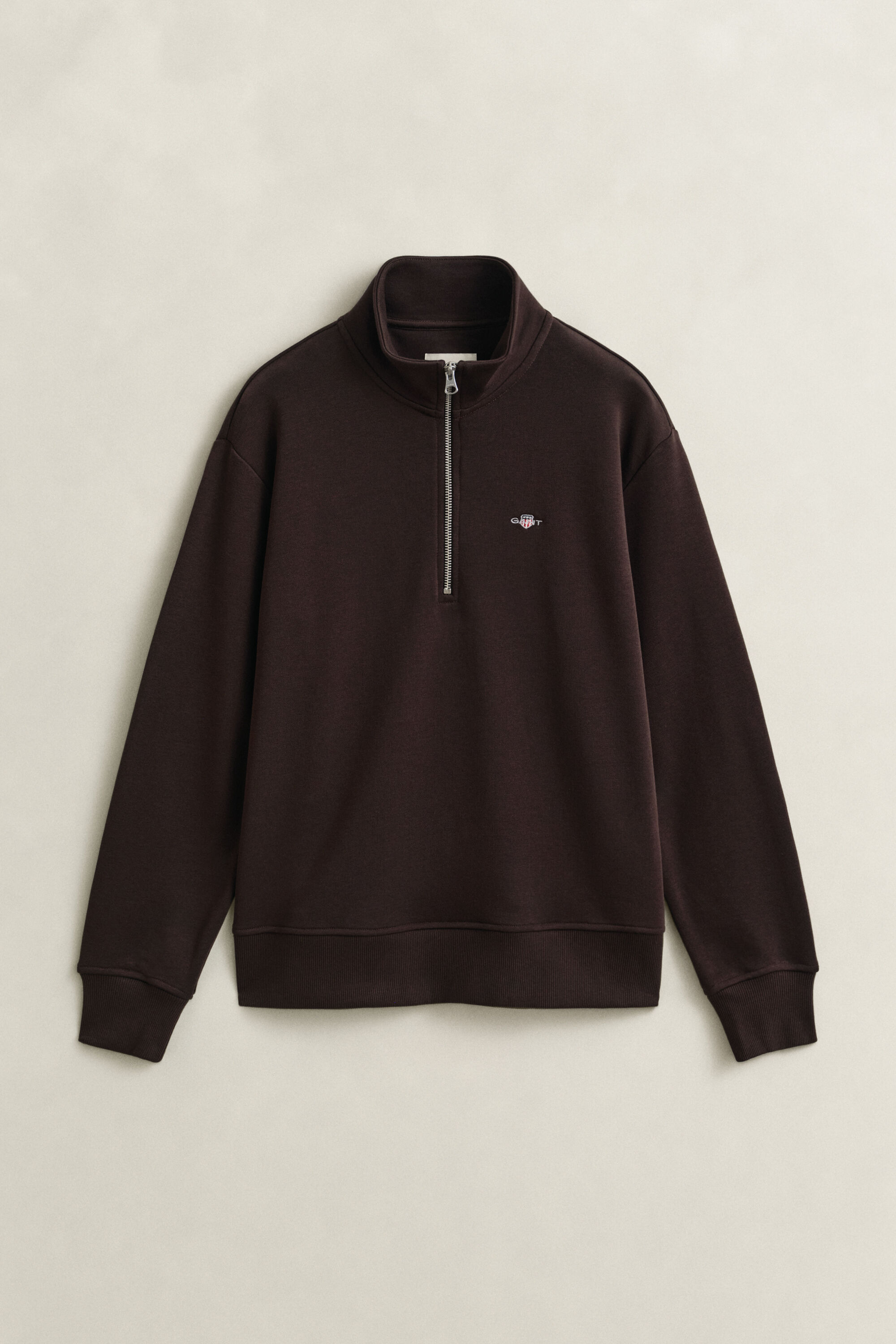 Sweat-shirt à demi-zip avec écusson