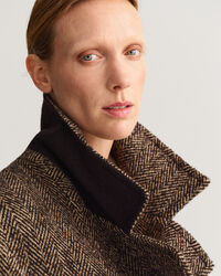 Overjas met visgraatmotief