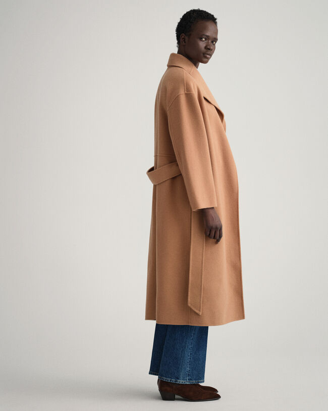 Manteau cousu main avec ceinture