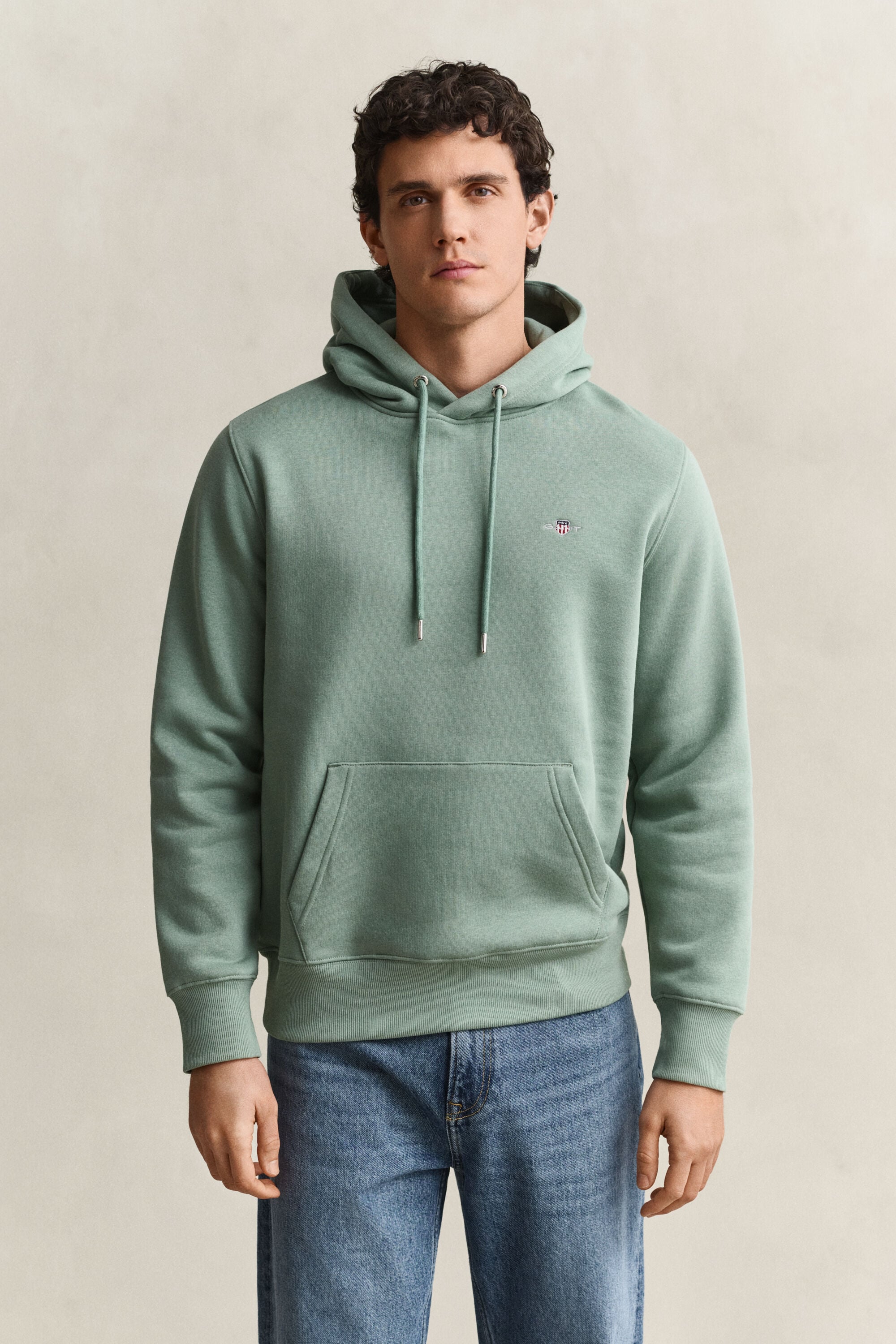Sweat à capuche avec écusson